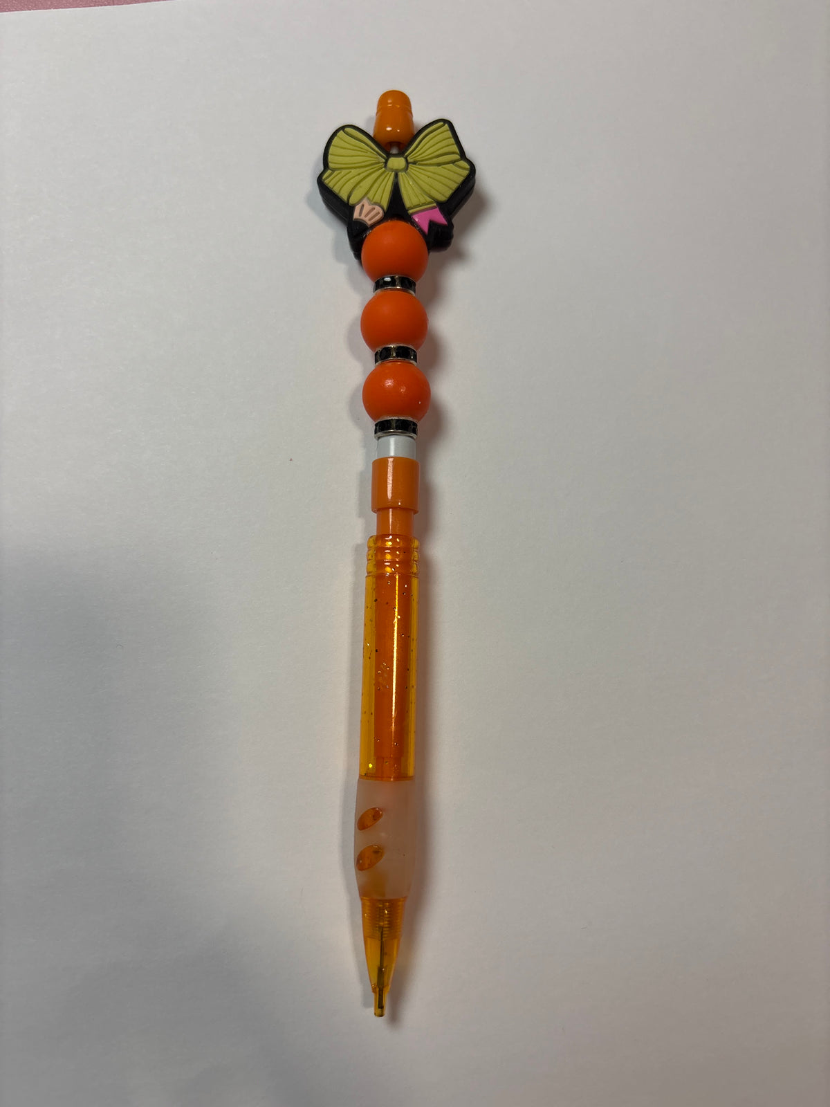 Orange bow pencil